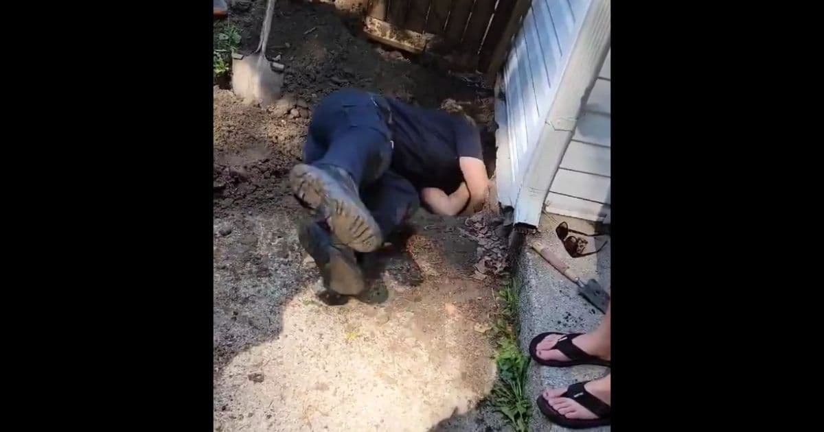 After Dog Manages to Dig Way Under Foundation of Home, Police 'Dog Whisperers' Called In for Rescue