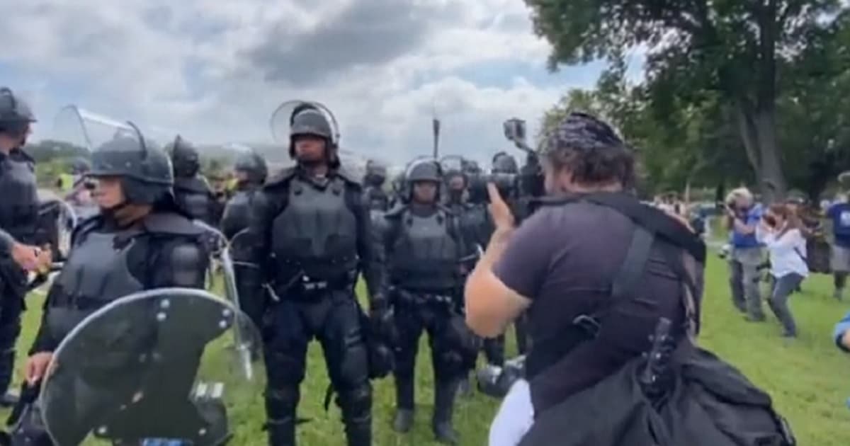 Fences Go up Around Capitol, Riot Police Deployed as Smattering of Protesters Show Up at 'Setup'