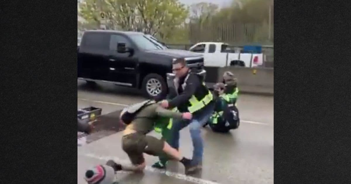 Video: Fed-Up Commuters Drag Climate Protesters Off Highway
