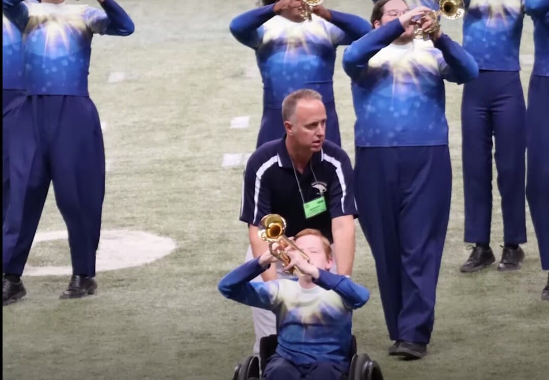High School Band Director Helps Student in Wheelchair Fulfill Marching Band Dream