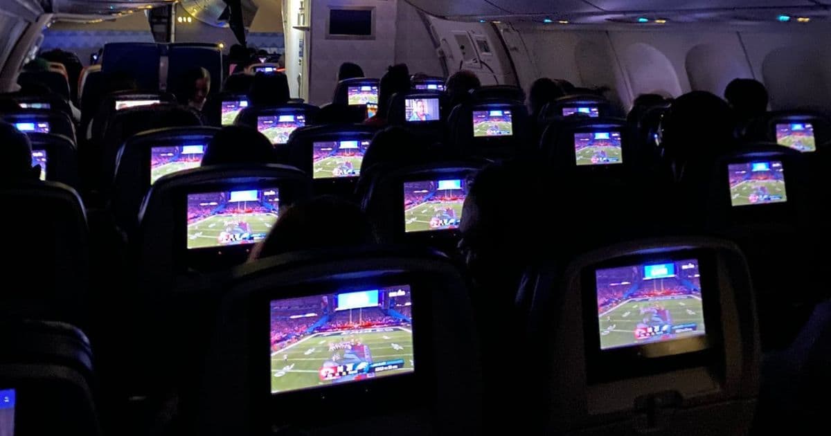 âShould Be Jailedâ: Photo of Plane Passengerâs Screen on Super Bowl Sunday Goes Viral