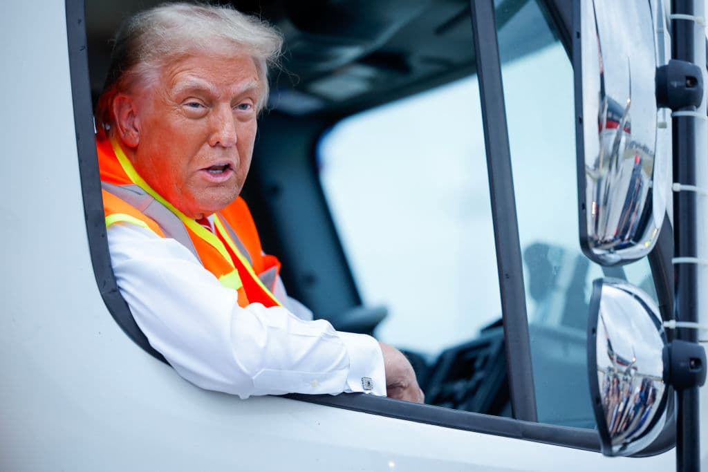 Photos: Trump Rides in MAGA Garbage Truck in Wisconsin