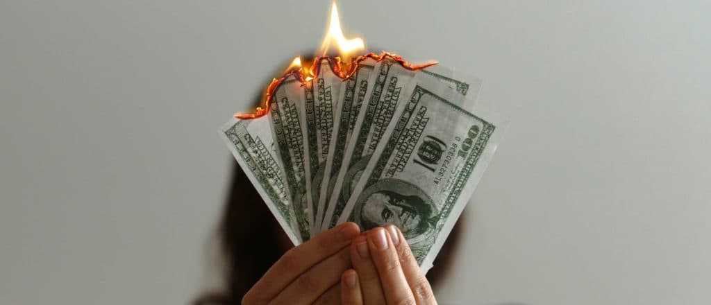 Can America Protect Itself While Drowning In Debt?