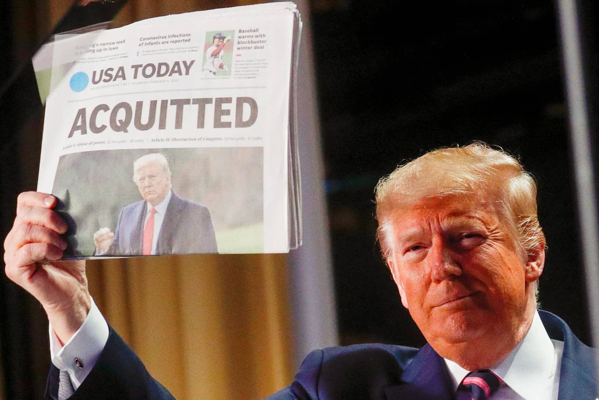 Trump Revels in His Acquittal as He Holds up âAcquittedâ Newspapers at National Prayer Breakfast