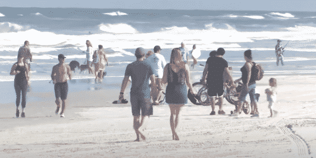 Floridians Rush to Beaches Hours After Gov. DeSantis Gives Green Light for Reopening
