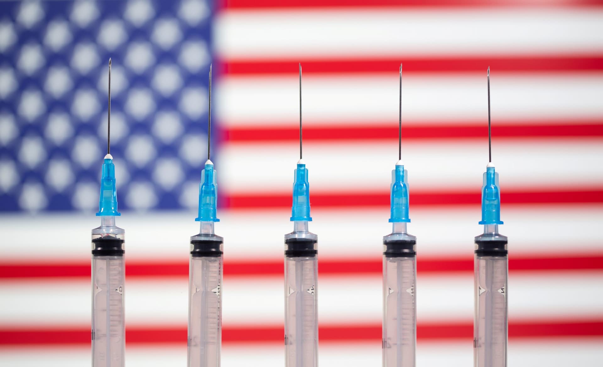 As US Companies Push To Get Workers Vaccinated, States Disagree on Who’s Essential