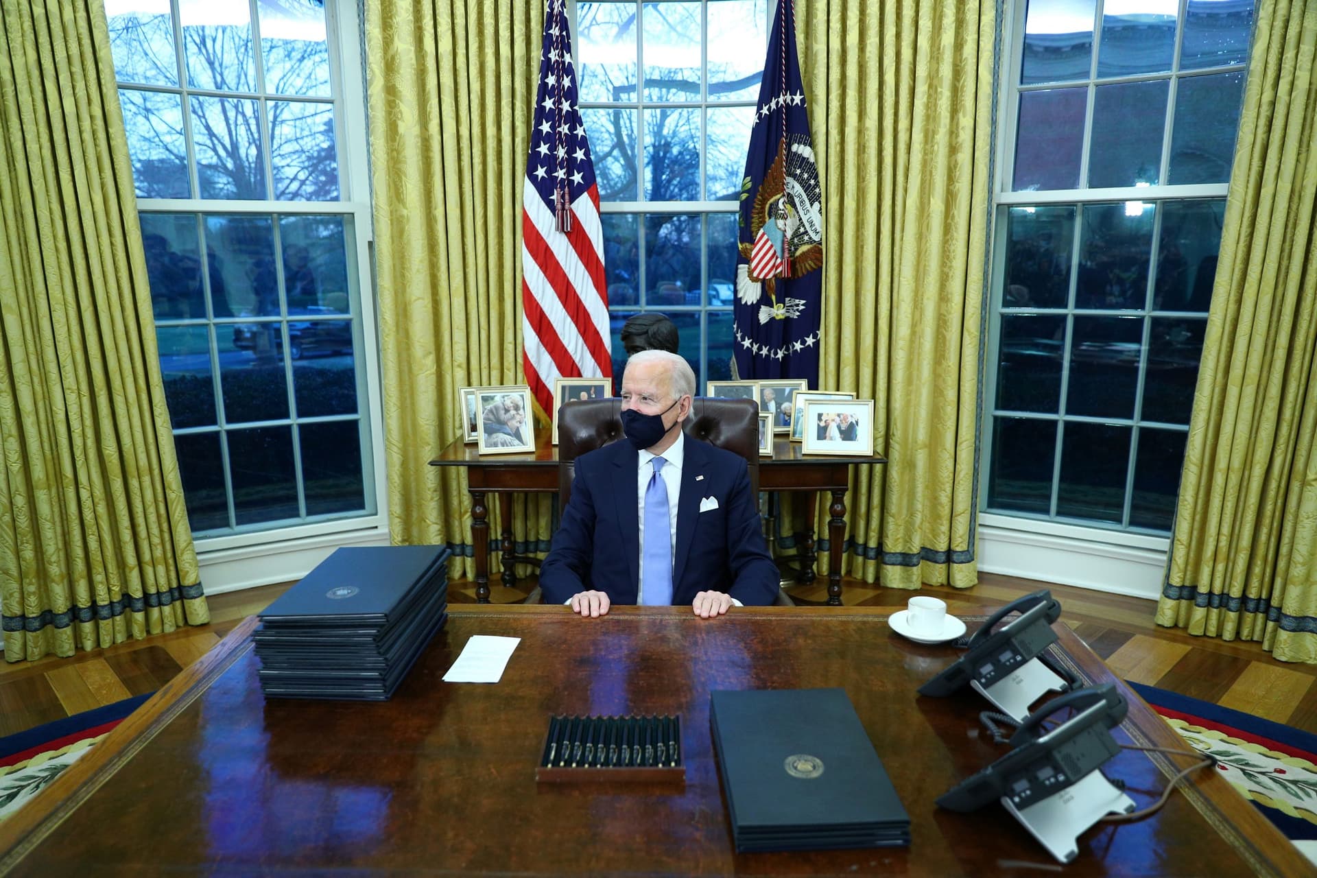 Biden Rolls Back Trump Policies on Wall, Climate, Health, Muslims