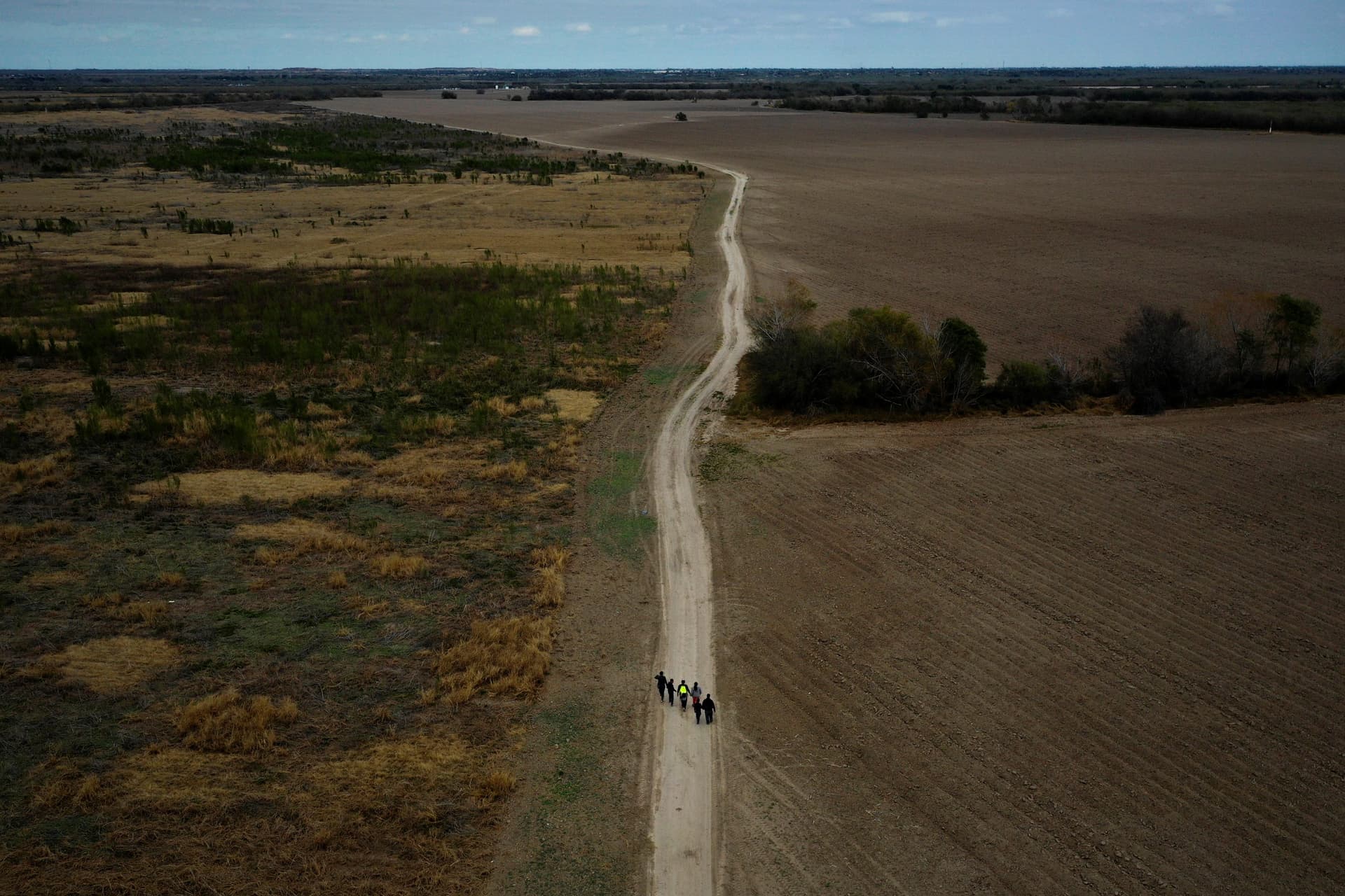 Migrants in Mexican Camp Brave Icy Nights, Chance To Enter US Nears