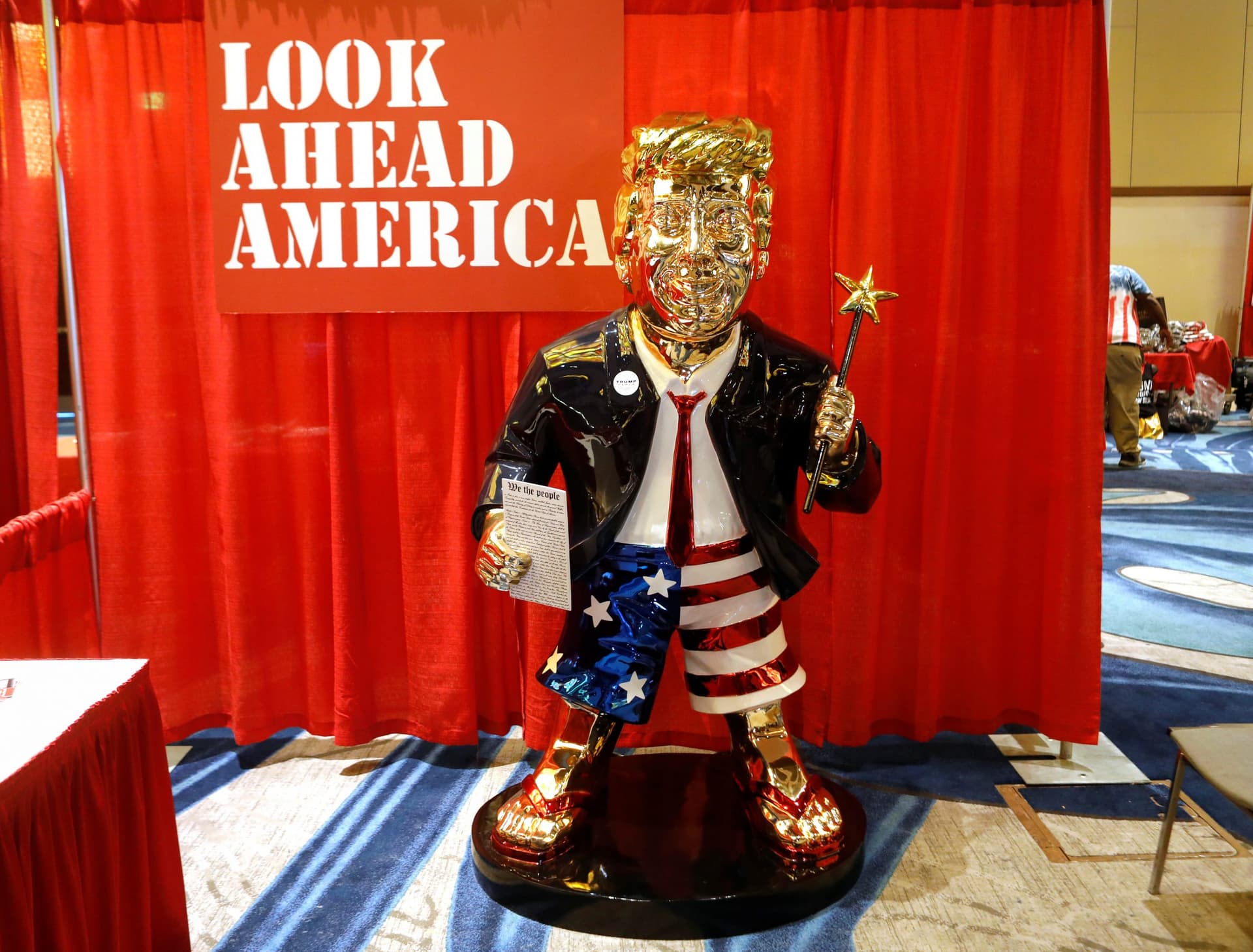 Commentary: Fact Check: Photo of Evangelicals Praying Over Golden Trump Statue Is Fake