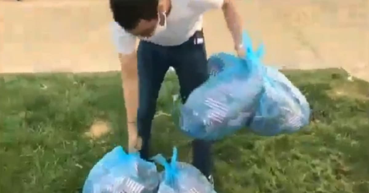 Outrage After Student Senator Recorded Throwing 2,977 9/11 Memorial Flags into Trash Bags