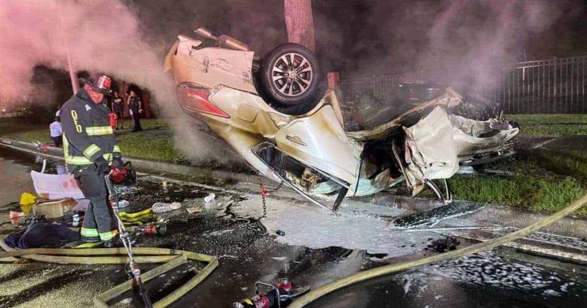 Woman Pinned in Flipped, Burning Car Faces Certain Death Until Firefighter Gives Her His Oxygen Mask