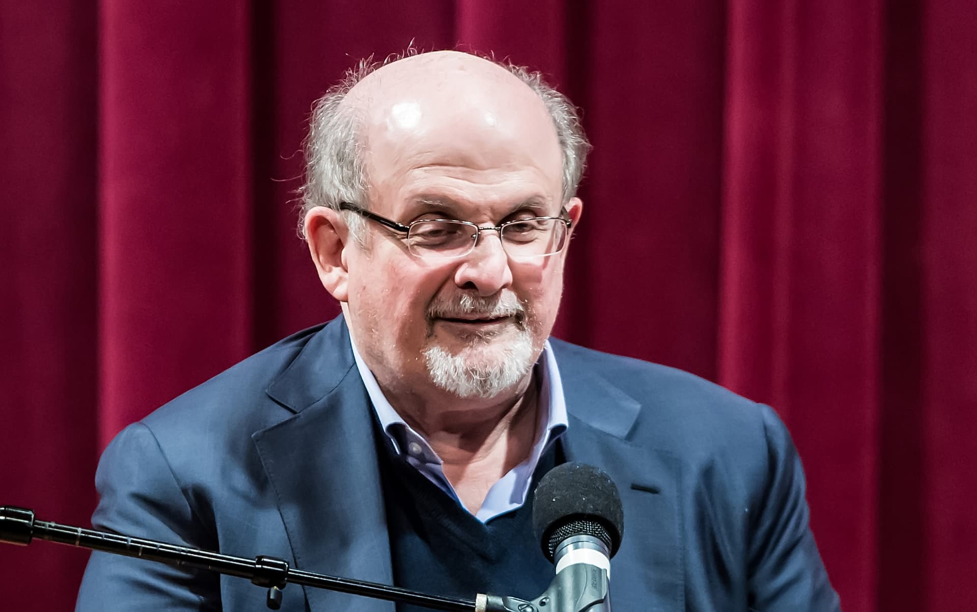 Controversial Author Attacked and Stabbed During a Lecture