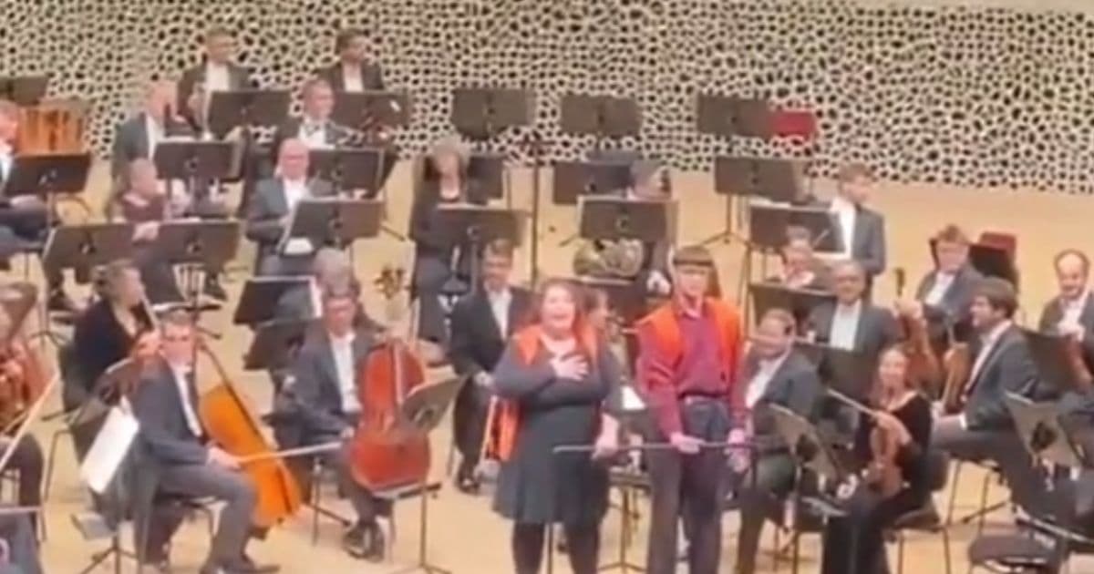 Climate Protesters Humiliated Moments After Gluing Themselves to Concert Hall Conductorâs Stand â They Never Realized It Could Do This