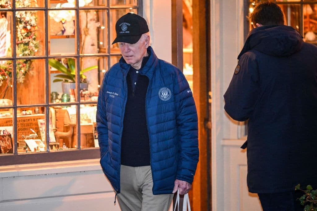 People Notice Something Creepy as Biden Walks by Restaurant and Peers in Window