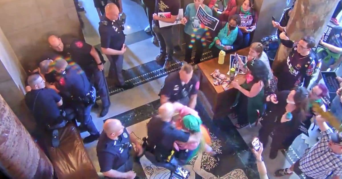 Watch: Pro-Trans Protester Punches Police Officer During Capitol Mob, 6 People Arrested