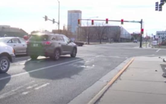 Woman Arrested After Driving Through Religious Group of People