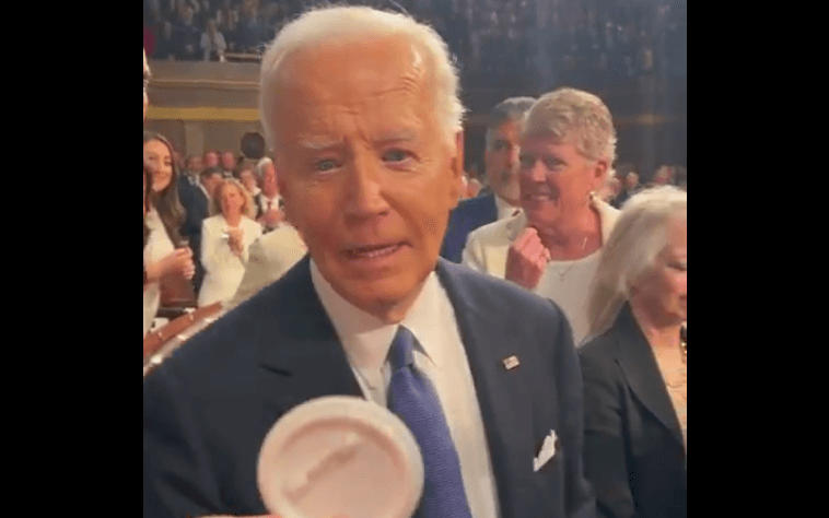 Marjorie Taylor Greene Confronts Biden as He Enters State of the Union, Hands Him a Button