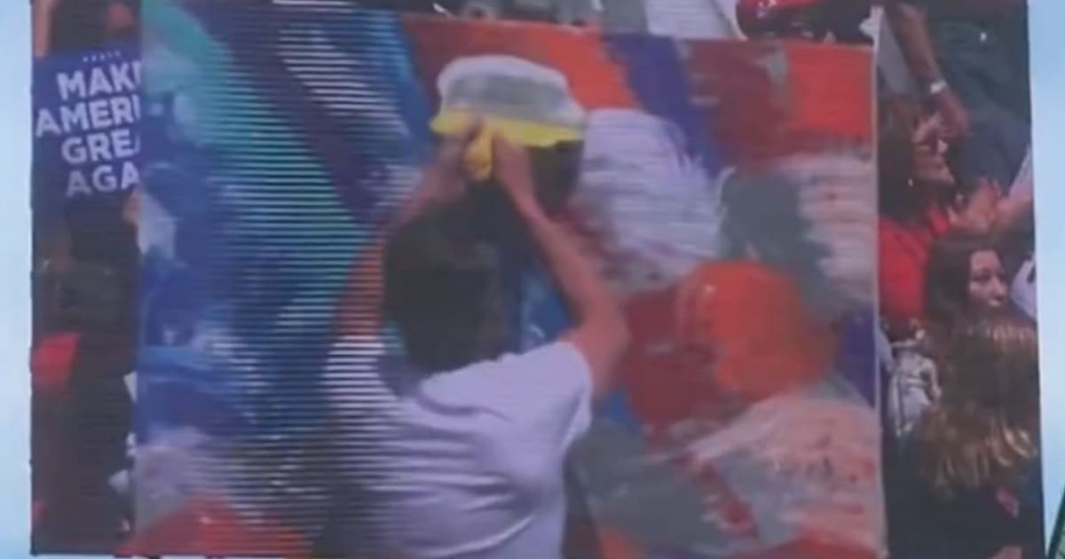Artist Furiously Painting US Flag at Trump Rally Begins Peeling Middle of Work, Crowd Goes Wild When They Realize Whatās Happening