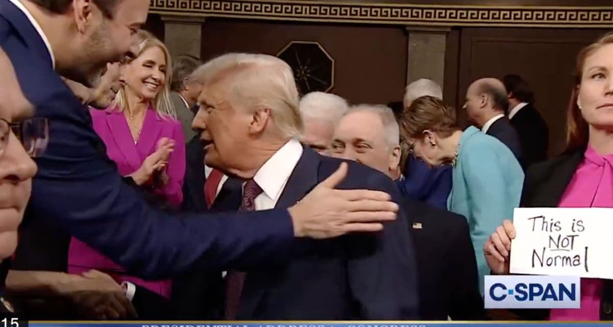 Republican Snatches Dem Repās āThis is Not Normalā Sign and Throws It As Trump Walks in