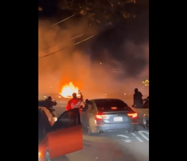 Watch: Queens Street Takeover Turns Violent, Couple Beaten and Car Set Ablaze