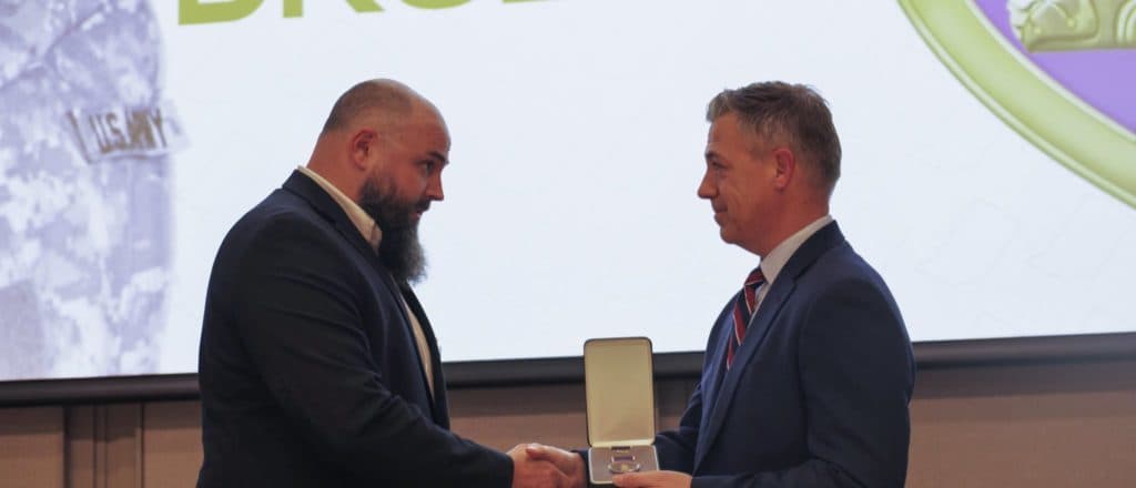 Sen Banks Pins Long-Deserved Purple Heart On Iraq Veteran After Nearly Two Decades