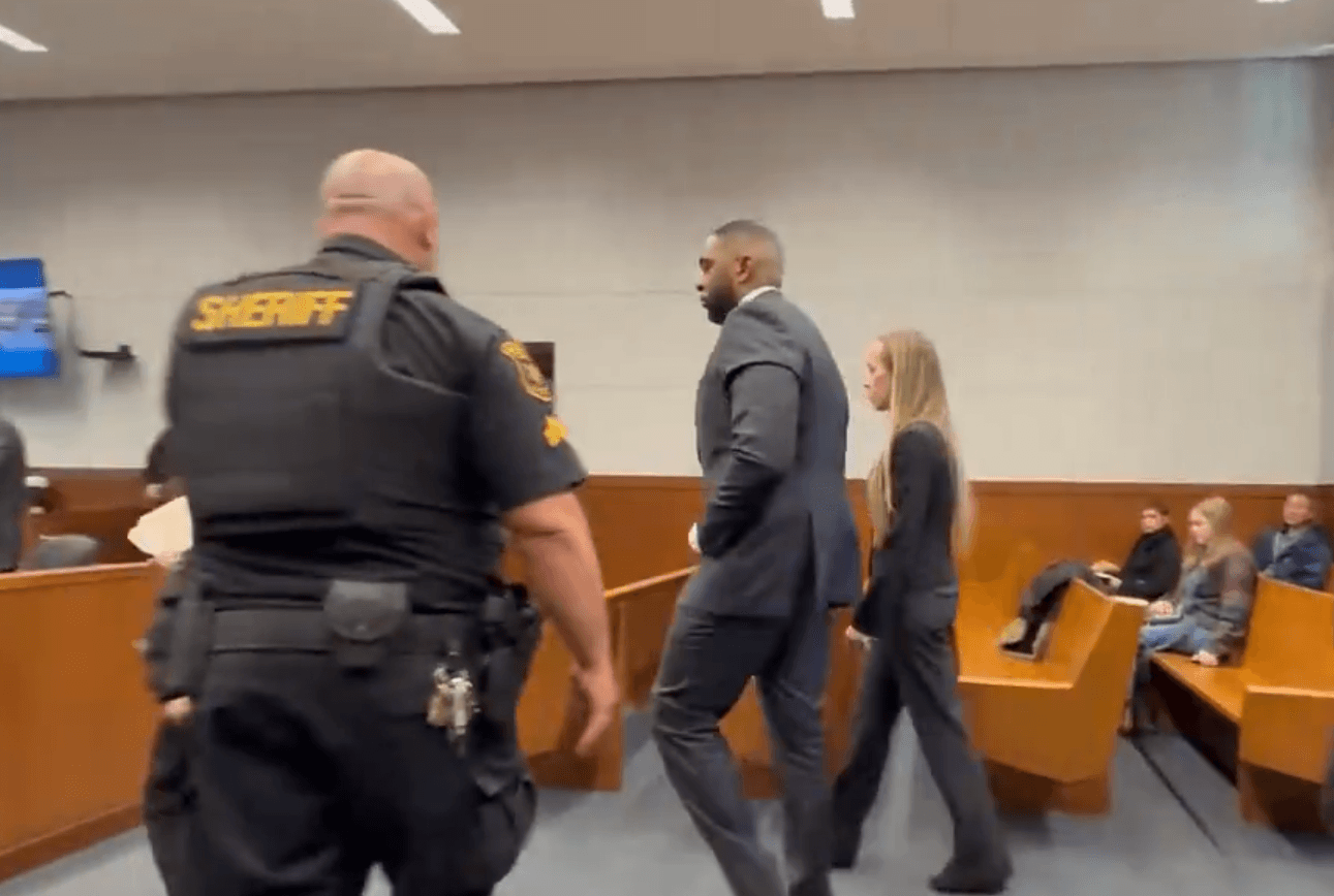 Ex-Michigan Coach Sherrone Moore Smiles in Court as Wife Looks On Amid Felony Case