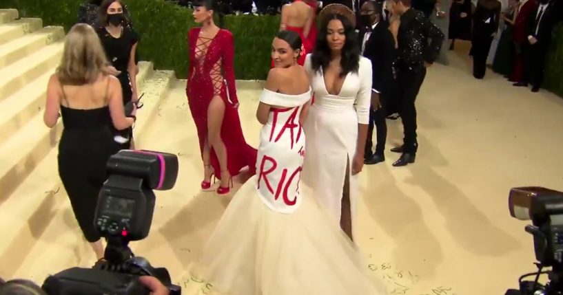 AOC Arrives at Met Gala Wearing 'Tax the Rich' Dress