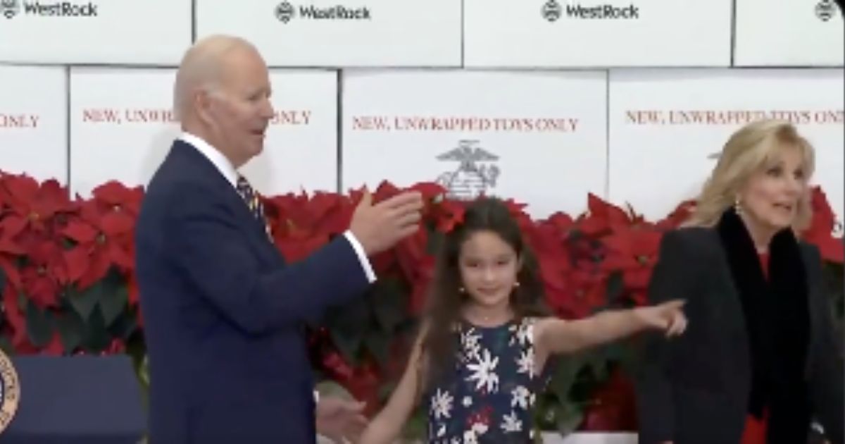 At a Toys for Tots event in Arlington, Virginia, on Monday, President Joe Biden had to be directed offstage by a young girl.