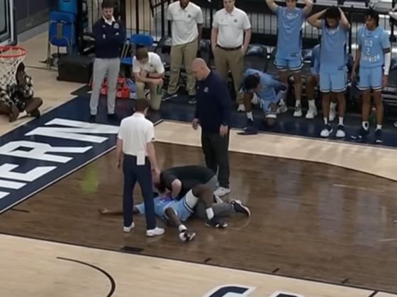 Old Dominion sophomore guard Imo Essien lies on the court after collapsing during a game against Georgia Southern.