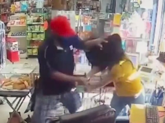 A security camera shows a clerk defending herself after being attacked in Los Angeles.