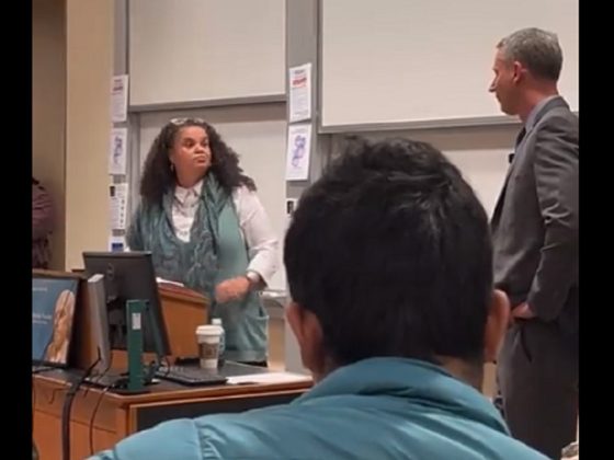 Stanford University Associated Dean Tirien Steinbach confronts U.S. Judge Stuart Kyle Duncan during an event at Stanford last weeki.