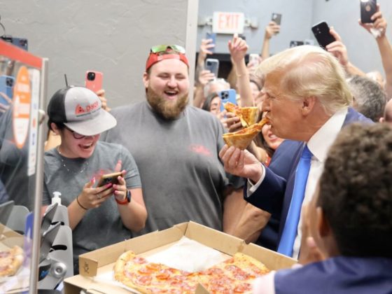 Former President Donald Trump was greeted by a huge crowd when he stopped by a pizza restaurant in Fort Myers, Florida, on Friday.