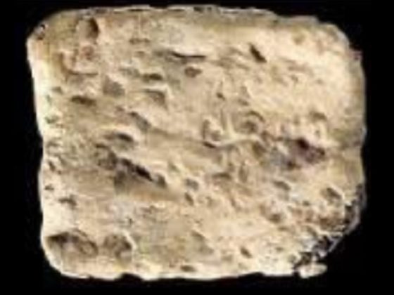 A tiny "curse tablet" found in an archaeological excavation in Israel.
