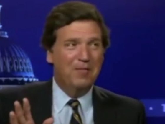 Tucker Carlson is seen in a behind-the-scenes video.