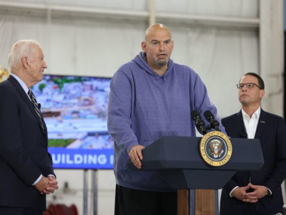 US President Joe Biden and Pennsylvania Governor Josh Shapiro look on as US Senator John Fetterman (D-PA) delivers remarks following a briefing on Interstate-95 highway emergency repair and reconstruction efforts, in Philadelphia, Pennsylvania, on June 17, 2023. (Photo by JULIA NIKHINSON / AFP) (Photo by JULIA NIKHINSON/AFP via Getty Images)