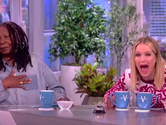 Sara Haines laughs at Whoopi Goldberg's slip-up on "The View" Tuesday.