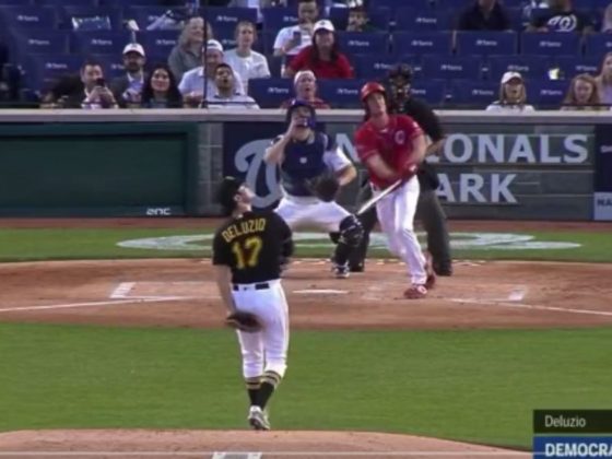 GOP Rep. Greg Steube, of Florida, hits a bases-loaded double against Rep. Chris Deluzio, a Democrat from Pennsylvania, during the third inning Wednesday of the Republicans' 16-6 rout of the Democrats in the annual Congressional Baseball Game, held at Nationals Park in Washington, D.C.