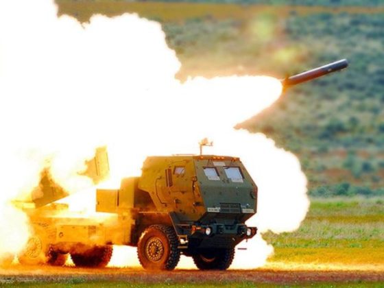 The Lockheed Martin High Mobility Artillery Rocket System launches a rocket.