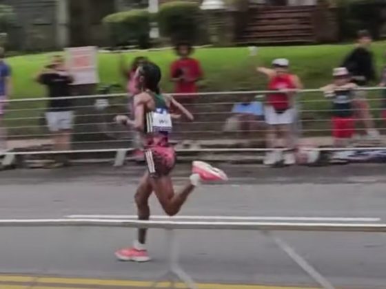 Senbere Teferi is seen running during the Peachtree Road Race in Atlanta on Tuesday.