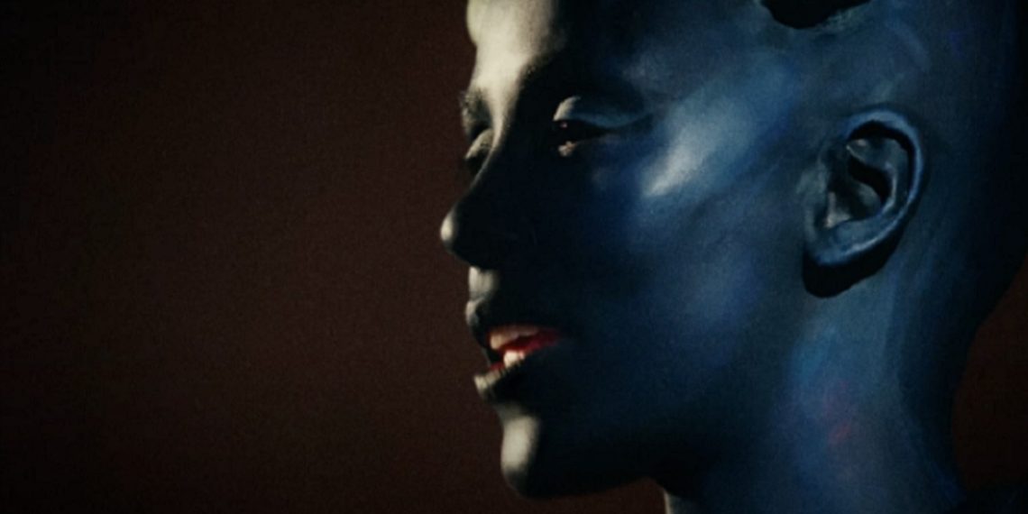 Singer Doja Cat appears in the video for the song "Paint the Town."