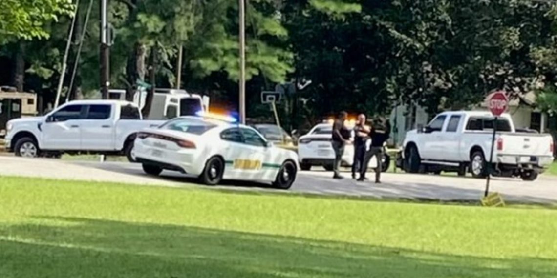 The scene outside a home in Henderson, Tennesee, where a man was shot to death during an Aug. 16 police raid.