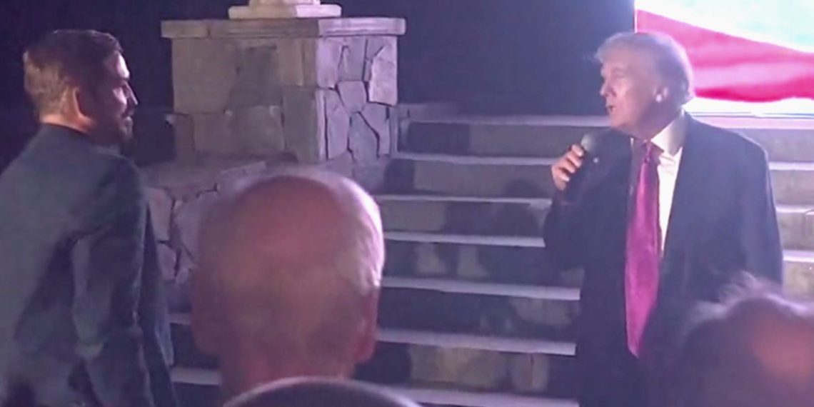 Former President Donald Trump, right, congratulates actor Jim Caviezel, left, after a screening of "Sound of Freedom."