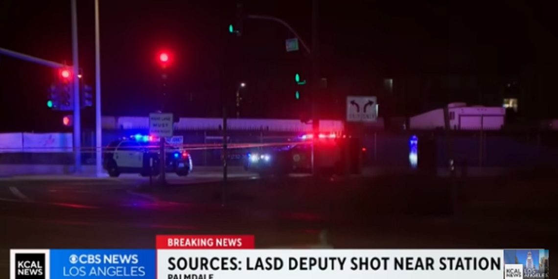 Law enforcement responds to the scene Saturday of the shooting of a Los Angeles County sheriff's deputy.