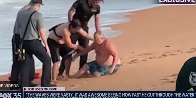 Police Officer Dramatically Rescues 2 Swimmers in Florida