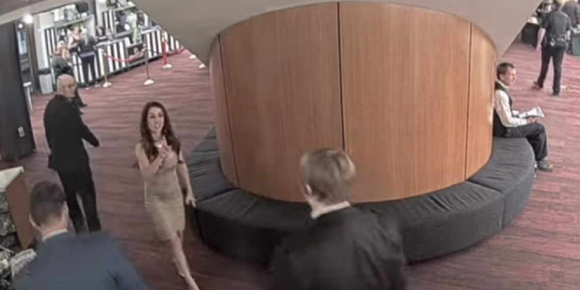 U.S. Rep. Lauren Boebert in a scene from a video being escorted out of a Denver theater for misbehavior on Sunday.