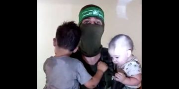 Hamas has released a video of militants holding Israeli children.