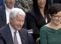 During a Wednesday Senate Banking Committee Hearing, Sen. John Kennedy made a joke referencing Alec Baldwin, causing JP Morgan Chase CEO Jamie Dimon, left, to laugh.