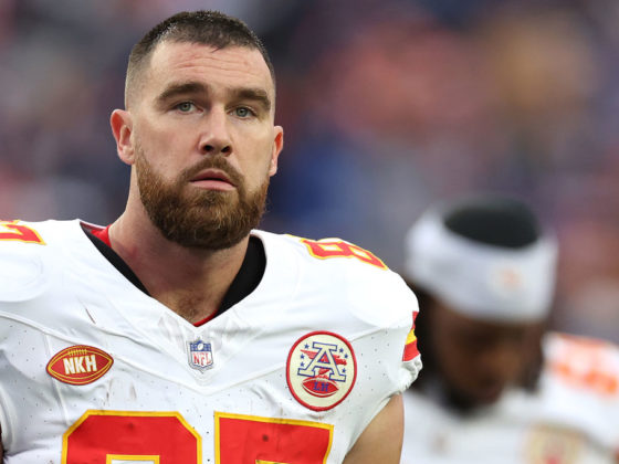 FOXBOROUGH, MASSACHUSETTS - DECEMBER 17: Travis Kelce #87 of the Kansas City Chiefs looks on without his helmet on the way to the locker room during halftime against the New England Patriots at Gillette Stadium on December 17, 2023 in Foxborough, Massachusetts. (Photo by Maddie Meyer/Getty Images)