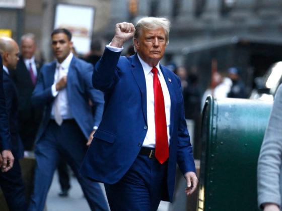 TOPSHOT - Former US President Donald Trump departs after speaking to the press after attending the civil fraud trial against the Trump Organization in New York State Supreme Court, in New York City on January 11, 2024. Donald Trump ignored warnings from the judge in his New York civil fraud trial Thursday and turned closing arguments into an election campaign attack, claiming that prosecutors are out to stop his political comeback. (Photo by John LAMPARSKI / AFP) (Photo by JOHN LAMPARSKI/AFP via Getty Images)