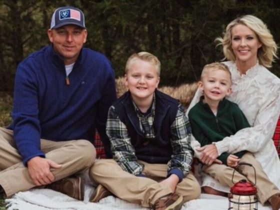 Cindy Mullins is seen with her husband and sons.